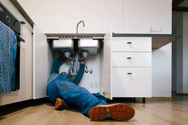 Professional Plumbing technician working in Clifton, TN
